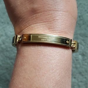 Michael Kors Astor Gold Buckle Bangle  0006484  Beaverbrooks the Jewellers